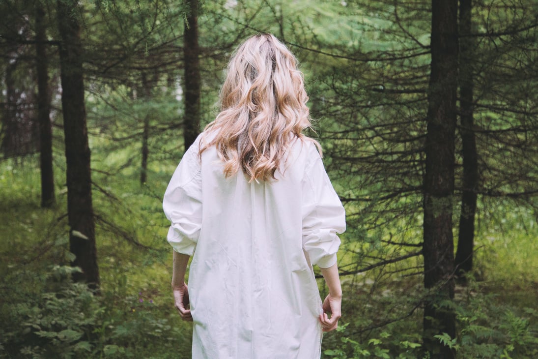 Blonde Woman entering the Forest