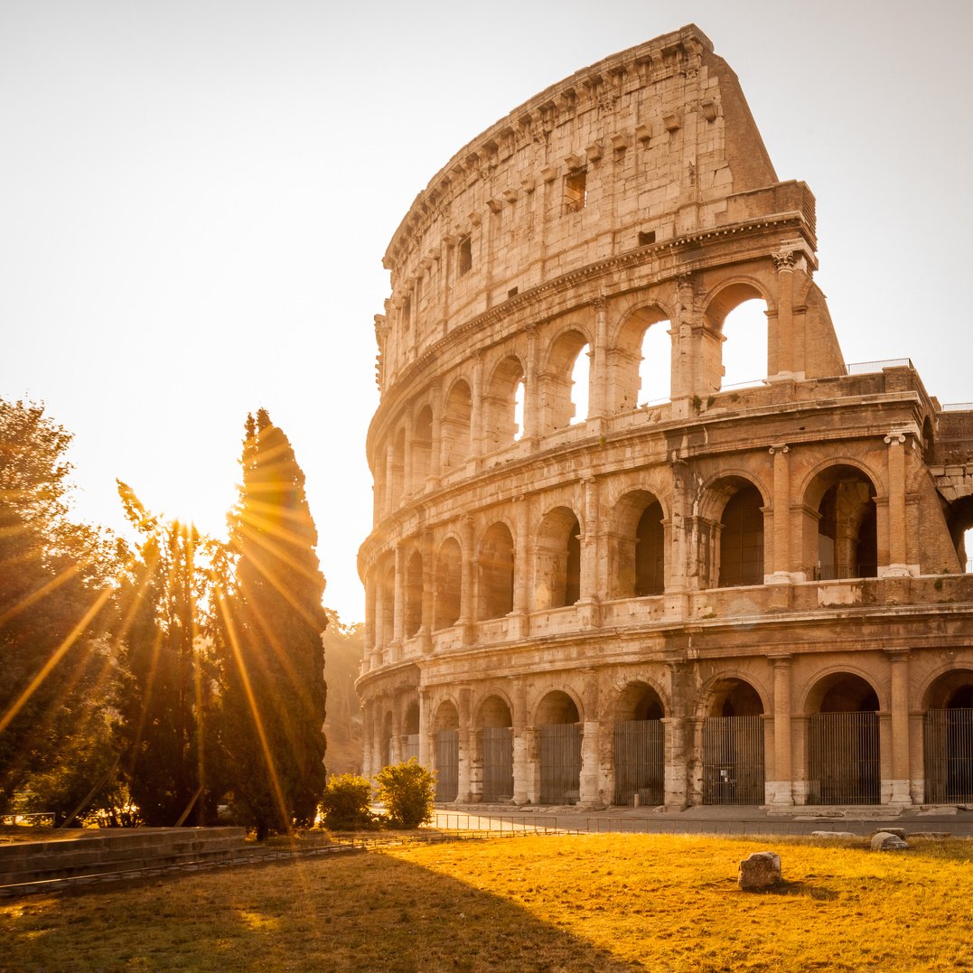 Colosseum at sunrise, Rome. Rome architecture and landmark. Rome Colosseum is one of the best known monuments of Rome and Italy